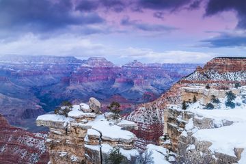 Grand Canyon at dusk with a layer of snow
