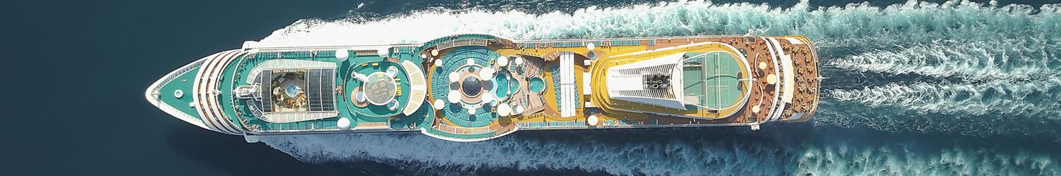 Aerial view large cruise ship at sea, Passenger cruise ship vessel, sailing across the Ksamil, Albania. View from drone.