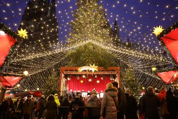 People walking at the Cologne Christmas Market, Germany