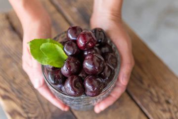 Bowl full of black cherries