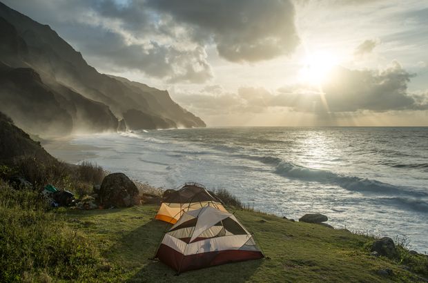 Campsite with view of the Na Pali coast and Kalalau Beach, on Kauai, Hawaii
