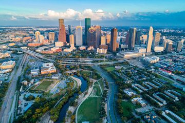 Aerial view of skyline downtown Houston and highway traffic at buffalo bayou park, Houston, Texas
