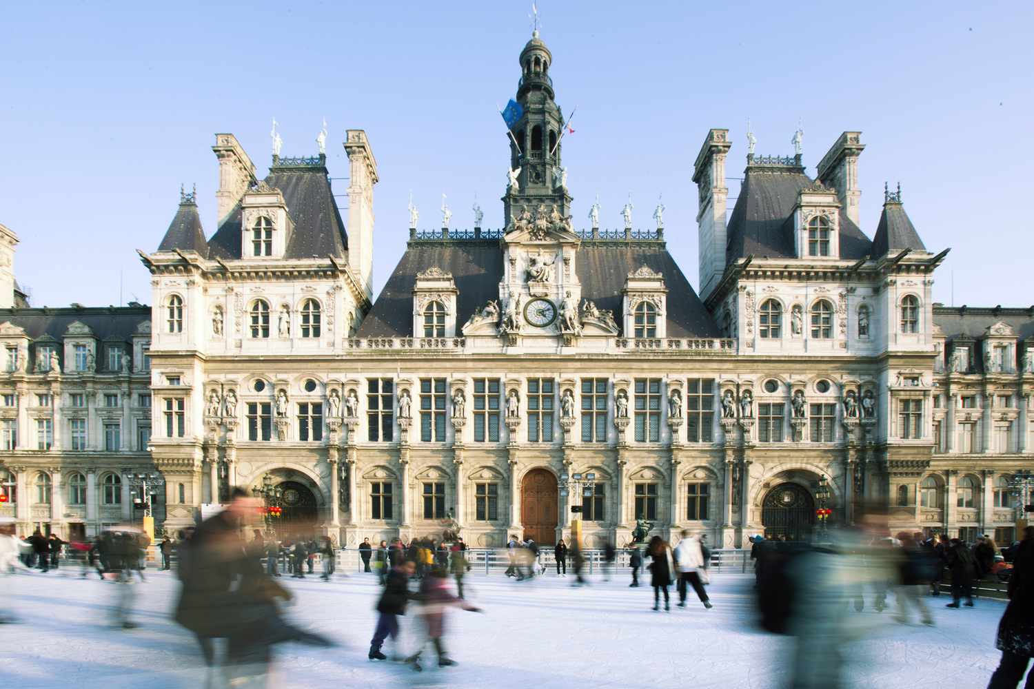 Ice skating at Hotel de Ville ice rink, Paris, France