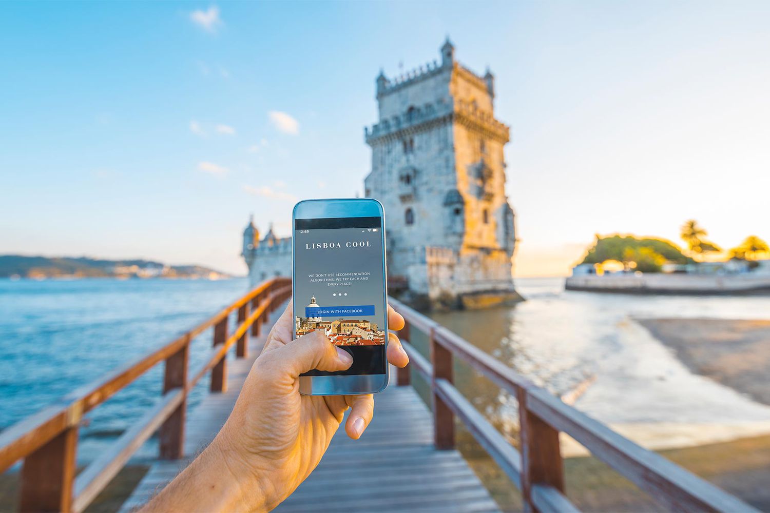 Lisboa Cool app on an iphone at the Belem Tower in Lisbon, Portugal