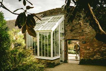 Brick wall entry way to the Heligan Gardens in Cornwall, England