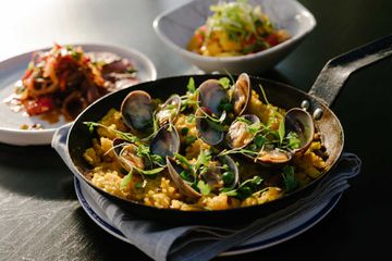 A dish of rice and clams