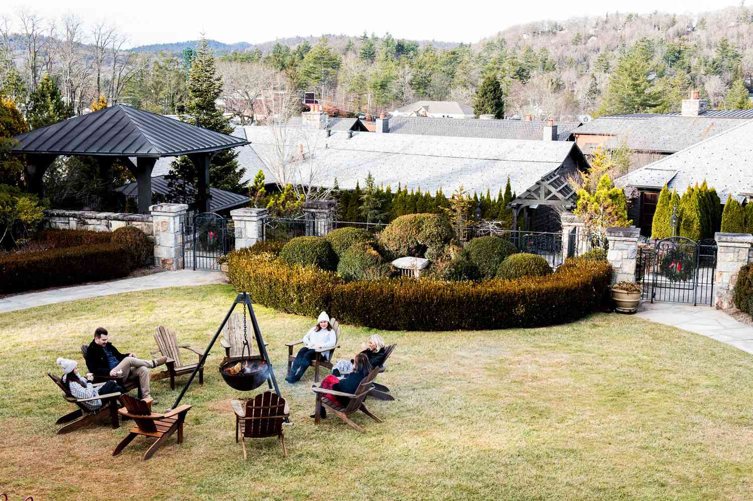 People sitting by a fire pit at Old Edwards Inn in Highlands, NC