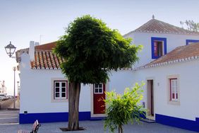 The town square of Porto Covo, Portugal