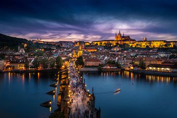 Prague, twilight overview of Charles Bridge, city and river, Czech Republic