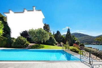 Photo illustration showing a pool by a lake; a house has been cut out of the image and negative space remains representing a disappearing house