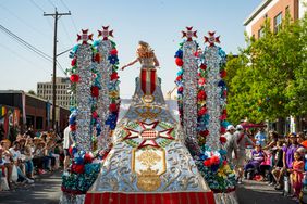 Parade princess float goes along the start of the parade route in San Antonio, Texas