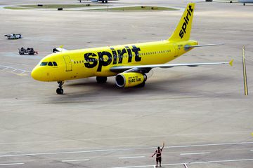 A Spirit Airlines Airbus A320 passenger jet taxis at the Dallas/Fort Worth International Airport
