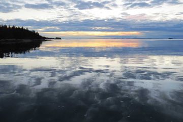 Sunsets are a daily attraction aboard the Schooner Lewis R. French, here anchored off the coast of Isle au Haut, Maine.