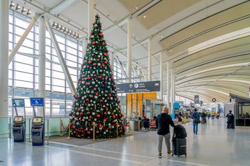A Christmas tree in an airport 