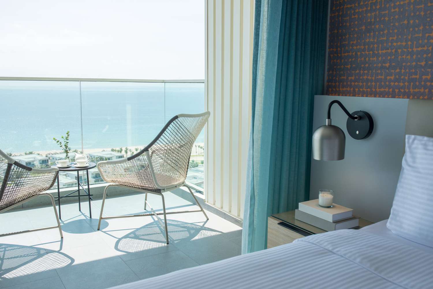 View to a guest room balcony at the Alma Resort