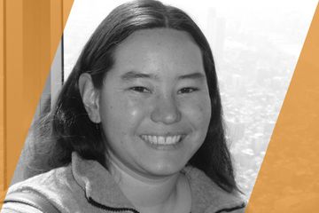 Black and white portrait of a person who is listed as an A List Travel Advisor 