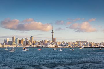 The famous and beautiful urban Cityscape of Auckland in Summer under atmospheric skyscape. Auckland, New Zealand, Oceania.
