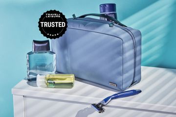 Away Large Toiletry Bag displayed with toiletries