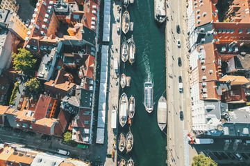 Aerial view of boats going down the harbor