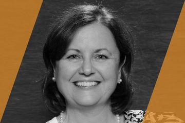 Black and white portrait of a person who is listed as an A List Travel Advisor 