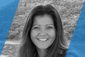 Black and white portrait of a person who is listed as an A List Travel Advisor 