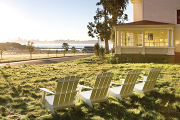 Adirondack chairs on a lawn at Cavallo Point