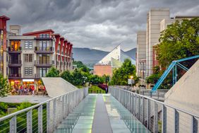 Chattanooga, Tennessee, USA downtown cityscape under a stormy sky.