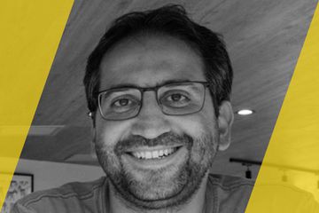 A black and white portrait of a person who is listed as an A List travel advisor/agent (names mentioned in text)
