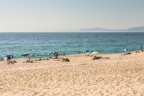 People relaxing and beach of Comporta, Sines, Alentejo, Portugal