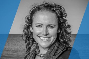 Black and white portrait of a person who is listed as an A List Travel Advisor 