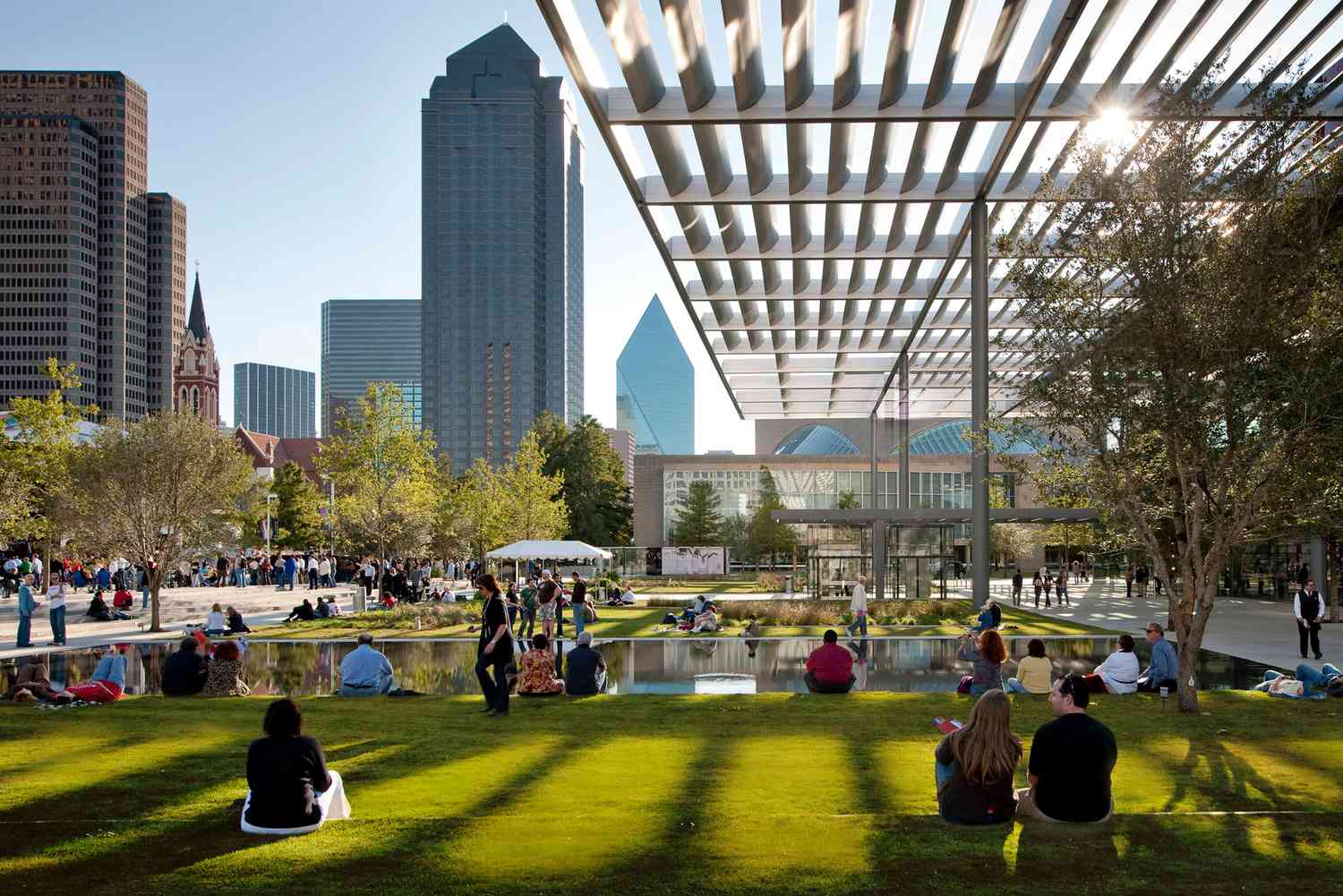 People enjoy the outdoors in Dallas's Arts District