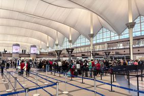 Passengers lined up to check in at Denver International Airport 