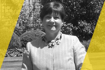 A black and white portrait of a person who is listed as an A List travel advisor/agent (names mentioned in text)