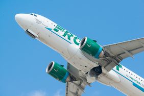 The under of a Frontier aircraft during take off
