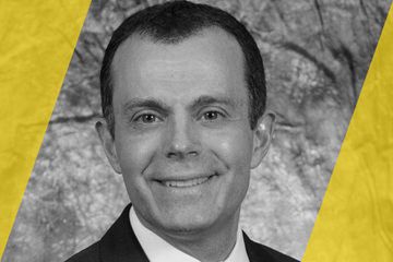 A black and white portrait of a person who is listed as an A List travel advisor/agent (names mentioned in text)