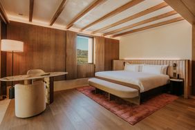 A guest room at Gran Hotel Mas d'en Bruno