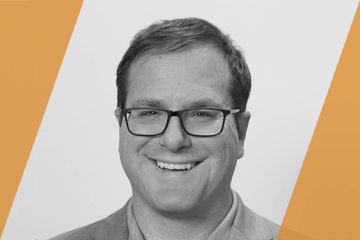 Black and white portrait of a person who is listed as an A List Travel Advisor 