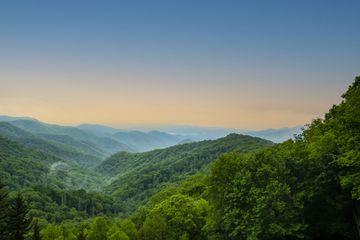 A sunset view of the great Smokey mountains with colorful skies