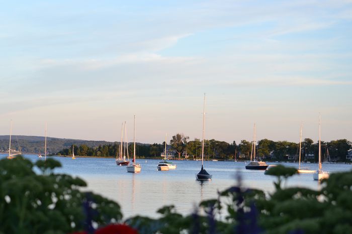 View of boats in the lake at sunset