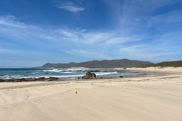 A sandy shoreline in Xala, Mexico