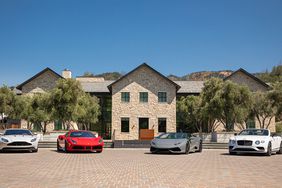 Luxury cars and Italian supercars outside of the Four Seasons Napa Valley 