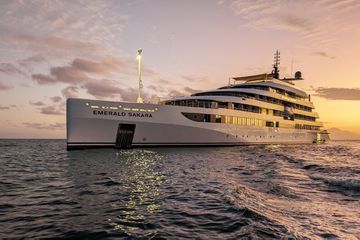 The exterior of the Emerald Sakara ship during sunset
