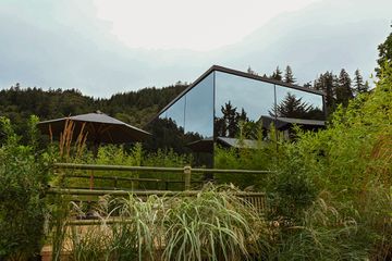 Exterior of a glass cabin at Tu Tu' Tun Lodge