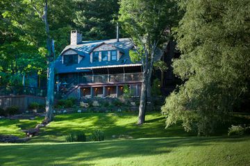 The lawn and exterior of Deer Mountain Inn
