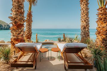 Lounge chairs around a plunge pool at Hotel San CristoÌbal 