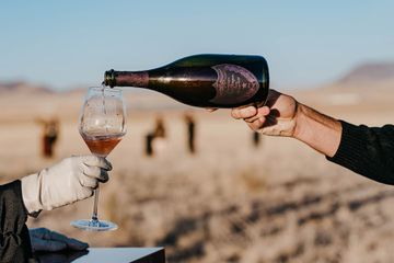 A glass of the Dom PÃ©rignon RosÃ© being poured