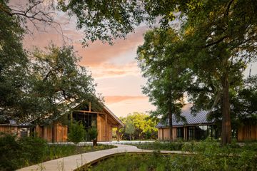 Exterior of the River Barns at The Dunlin during sunset