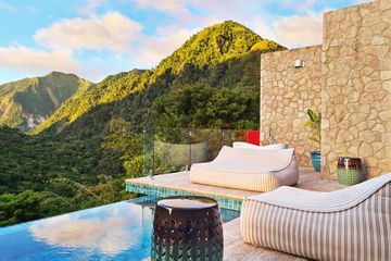Plunge pool and view from a spa terrace at Coulibri Ridge