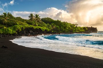 The black sand beach of Waianapanapa State Park on Maui