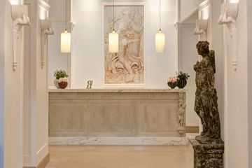 The front lobby desk at Hotel Savoy 